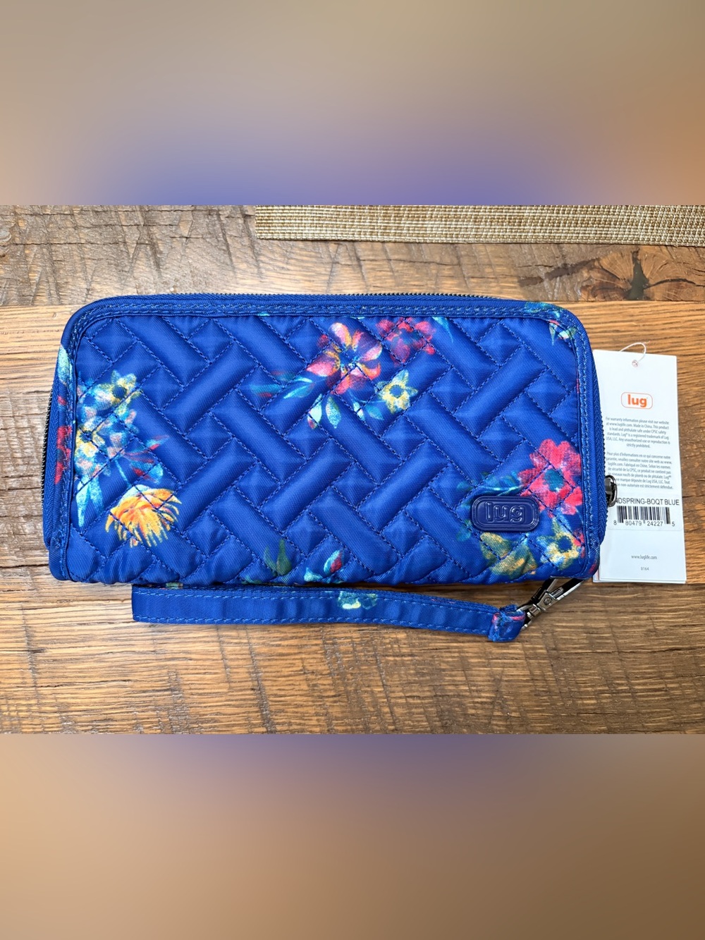 Lug Handspring Wallet with Wristlet strap. Bouquet Blue. NWT